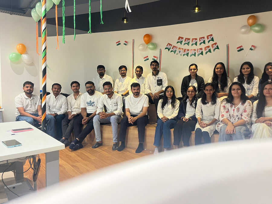 Group photo of Celebrating Republic Day with festive decorations at the Ambiw office.