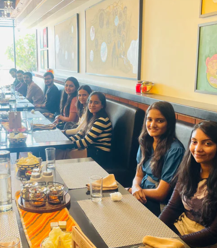 The Ambiw team enjoying a group lunch outing and celebrating milestones together.