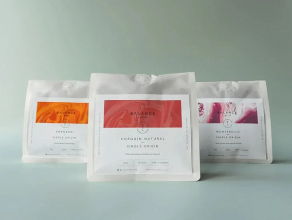 Three bags of Balance Coffee's Single Origin range—Rwenzori, Corquin Natural, and Montebello—lined up