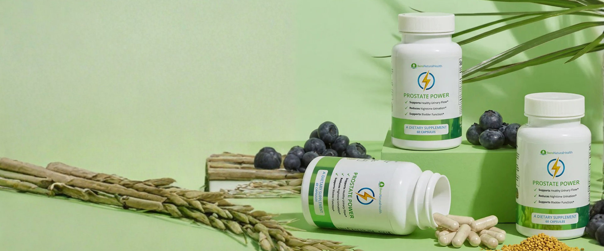 A studio product photograph showcasing Ben's Natural Health "Prostate Power" dietary supplement bottles arranged